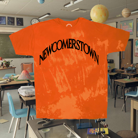 "NEWCOMERSTOWN" Puff Arch Acid Wash Tee